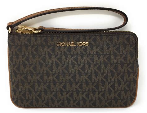 michael kors jet set large zip clutch wristlet|Michael Kors saffiano wallet.